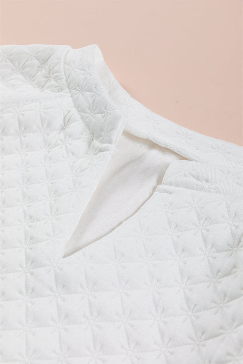 Split Neck Quilted Long Sleeve Top
